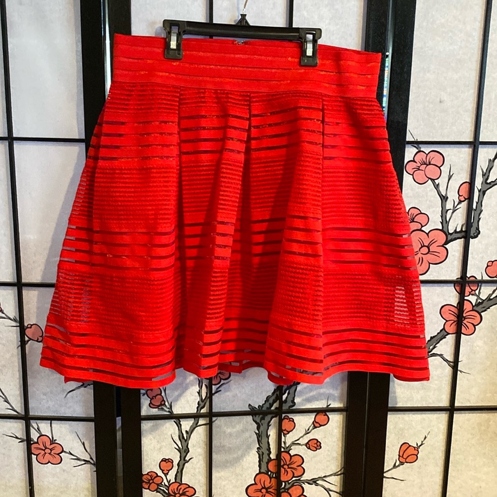 Vibrant red   Right above the knee